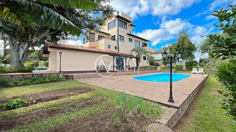 Casa de Condomínio à venda com 5 quartos, 455m², 2 suítes, 7 vagas, Rua Francisco Solano Borges no bairro Hípica em Porto Alegre