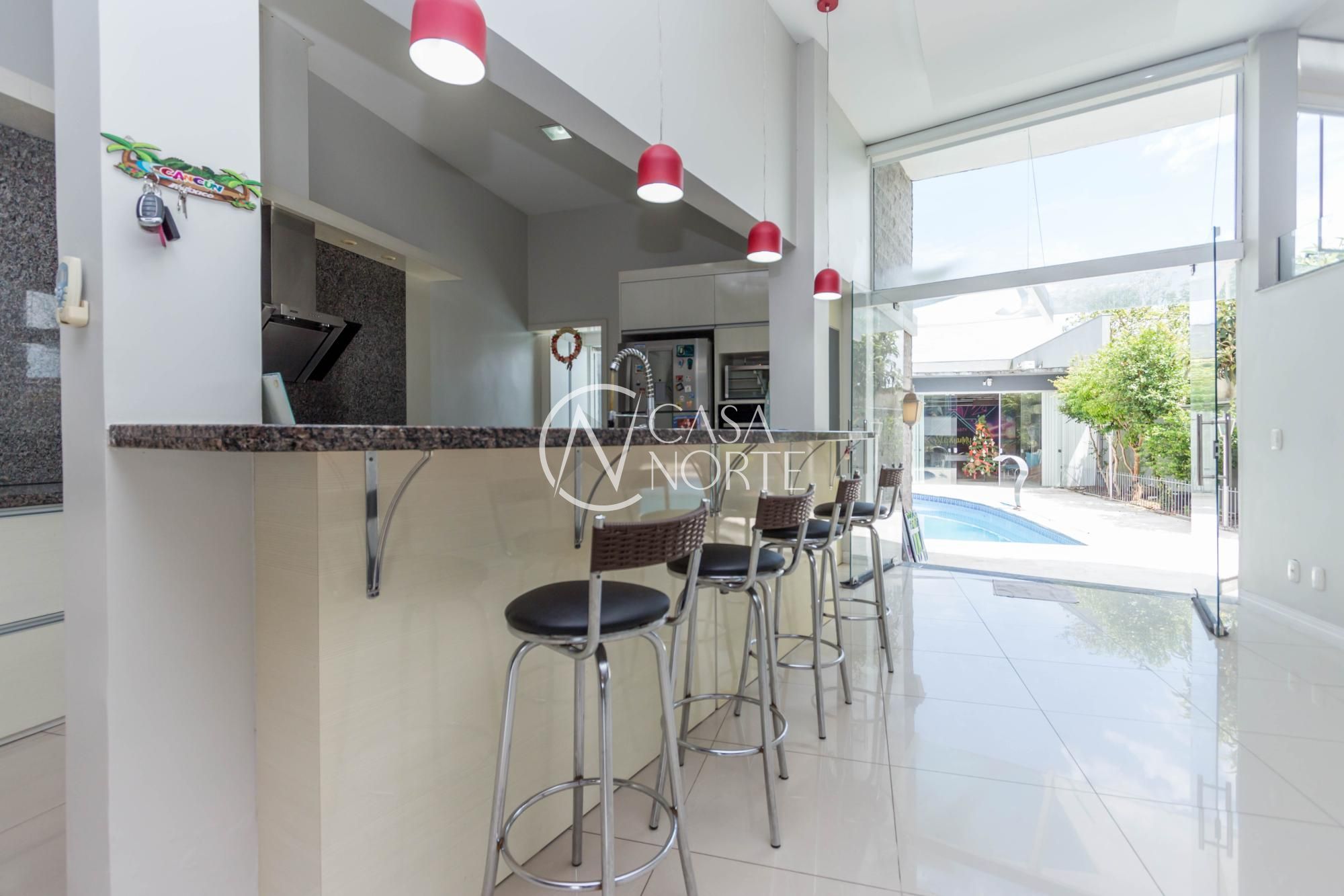 Casa à venda com 3 quartos, 420m², 2 suítes, 4 vagas, Rua Delfino Riet no bairro Santo Antônio em Porto Alegre