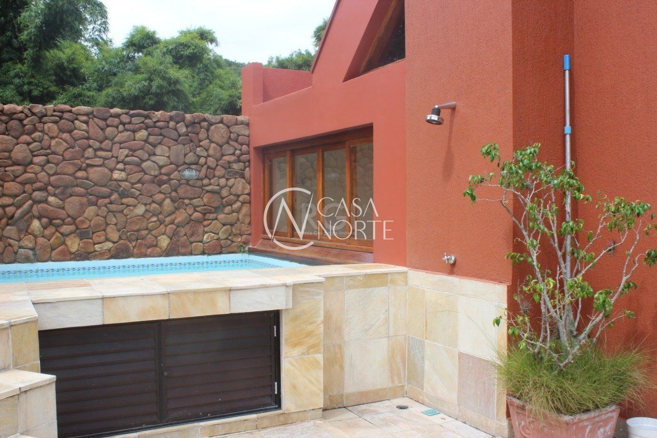 Casa de Condomínio à venda com 4 quartos, 379m², 1 suíte, 2 vagas, Rua Silveiro no bairro Menino Deus em Porto Alegre