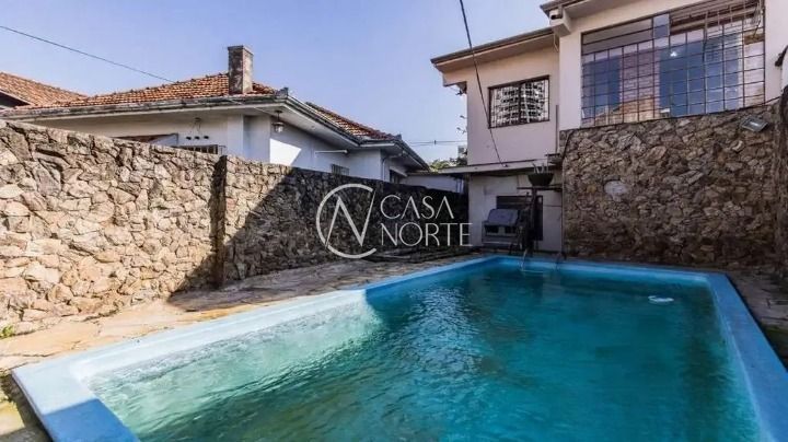 Casa à venda com 3 quartos, 190m², 1 suíte, 2 vagas, Avenida Mariland no bairro Auxiliadora em Porto Alegre