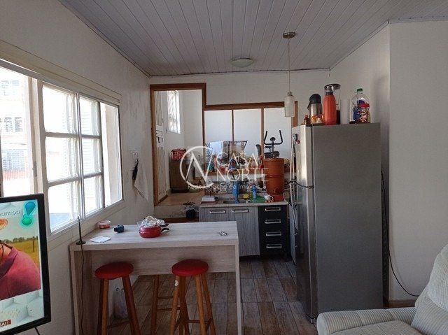 Casa à venda com 4 quartos, 200m², 4 vagas, Rua Leopoldo de Freitas no bairro Passo da Areia em Porto Alegre