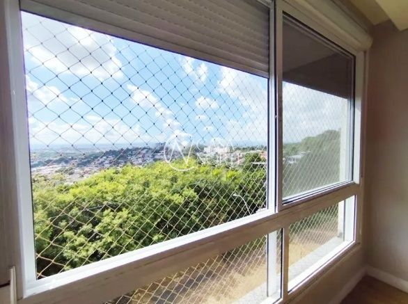 Casa à venda com 3 quartos, 1 suíte, 2 vagas, Rua Professor Luiz Antônio Lopes no bairro Morro Santana em Porto Alegre