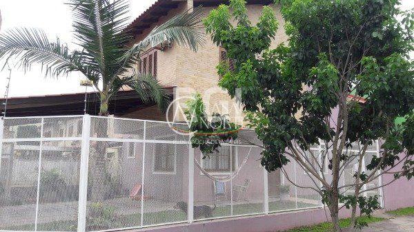 Casa à venda com 3 quartos, 100m², 1 suíte, 2 vagas, Rua Eva Pinto no bairro Hípica em Porto Alegre