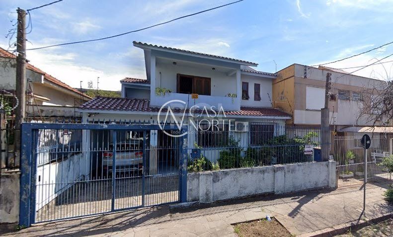 Casa à venda com 4 quartos, 270m², 1 suíte, 5 vagas, Rua Coronel Jaime da Costa Pereira no bairro Partenon em Porto Alegre