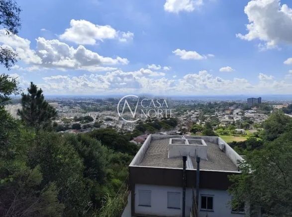 Casa à venda com 3 quartos, 1 suíte, 2 vagas, Rua Professor Luiz Antônio Lopes no bairro Morro Santana em Porto Alegre