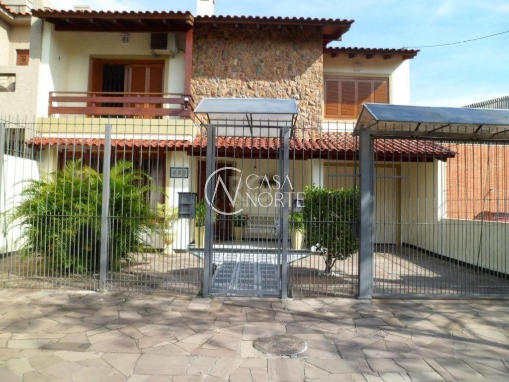 Casa à venda com 4 quartos, 216m², 1 suíte, 8 vagas, Rua Adao Pinheiro da Silva no bairro Aberta dos Morros em Porto Alegre