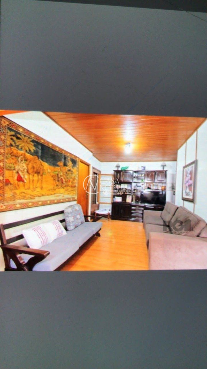 Casa à venda com 3 quartos, 247m², 2 vagas, Rua Professor Fitzgerald no bairro Petrópolis em Porto Alegre