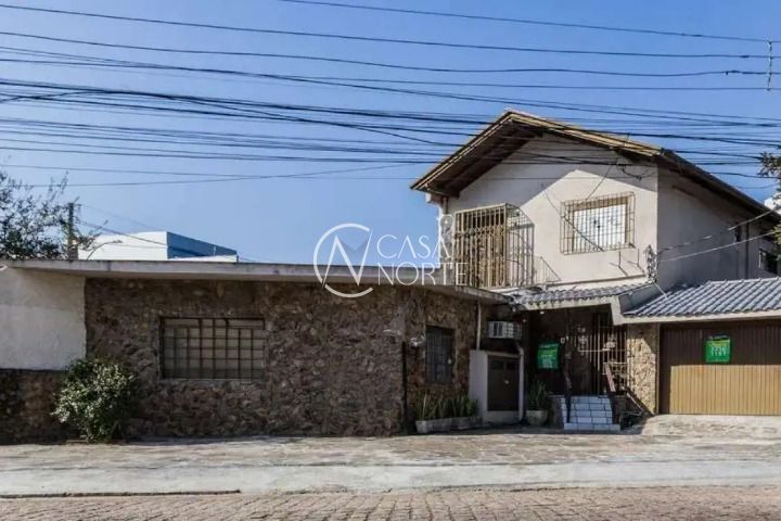 Casa à venda com 3 quartos, 190m², 1 suíte, 2 vagas, Avenida Mariland no bairro Auxiliadora em Porto Alegre
