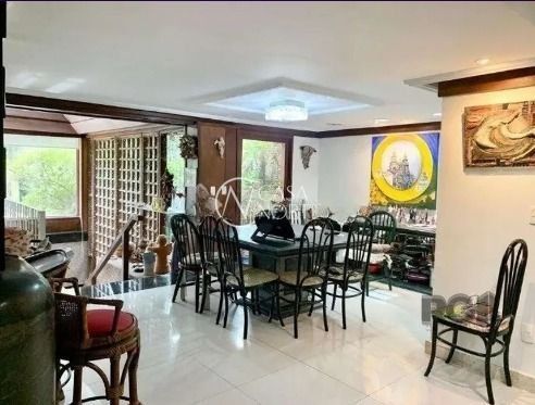 Casa à venda com 4 quartos, 982m², 1 suíte, 8 vagas, Rua Charruas no bairro Espírito Santo em Porto Alegre