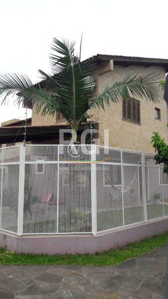 Casa à venda com 3 quartos, 100m², 1 suíte, 2 vagas, Rua Eva Pinto no bairro Hípica em Porto Alegre