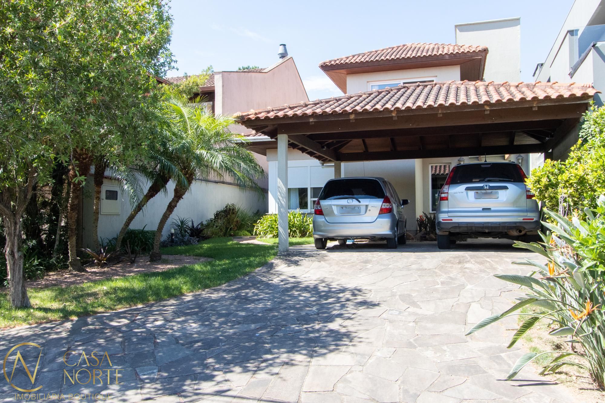 Casa de Condomínio à venda com 3 quartos, 294m², 3 suítes, 3 vagas, Avenida Juca Batista no bairro Belém Novo em Porto Alegre