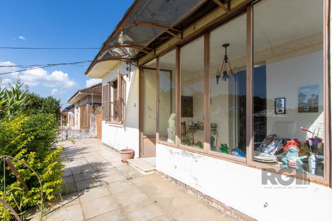 Casa à venda com 2 quartos, 400m², 1 vaga, Rua Oscar Tollens no bairro Santa Tereza em Porto Alegre