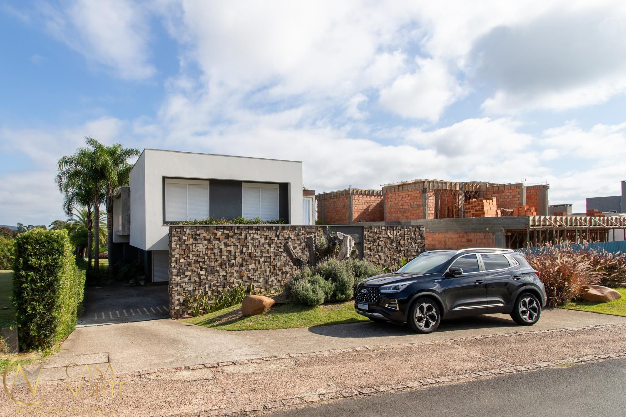 Casa de Condomínio à venda com 4 quartos, 541m², 4 suítes, 5 vagas, Avenida Juca Batista no bairro Belém Novo em Porto Alegre