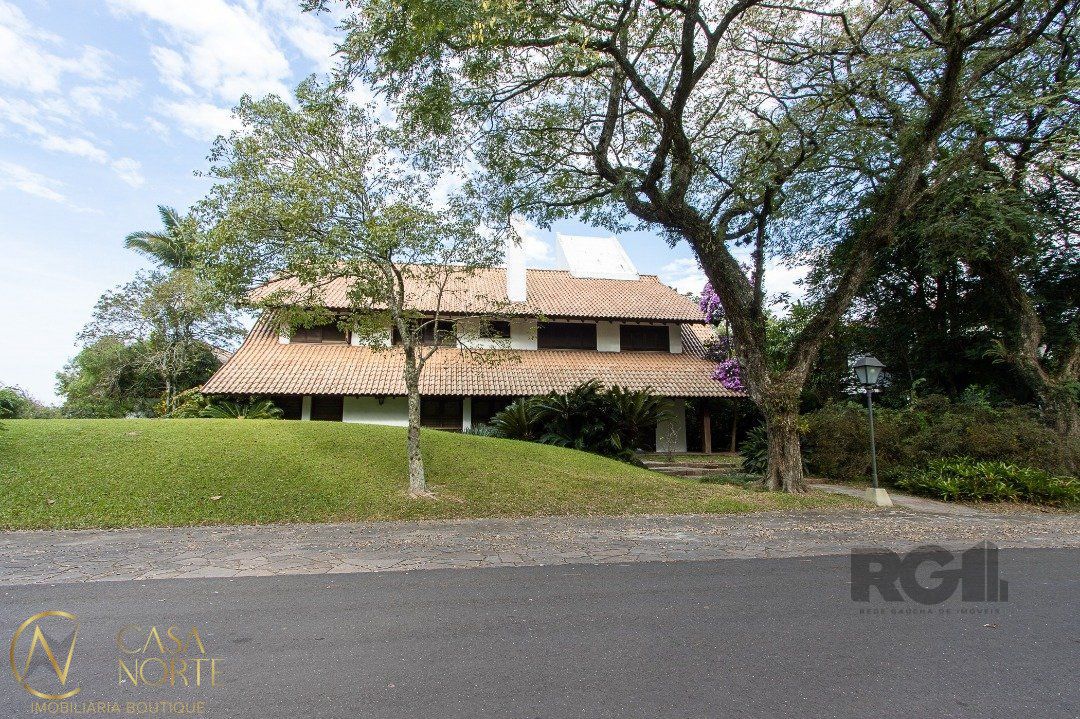 Casa de Condomínio à venda com 6 quartos, 702m², 2 suítes, 6 vagas, Avenida da Cavalhada no bairro Cavalhada em Porto Alegre