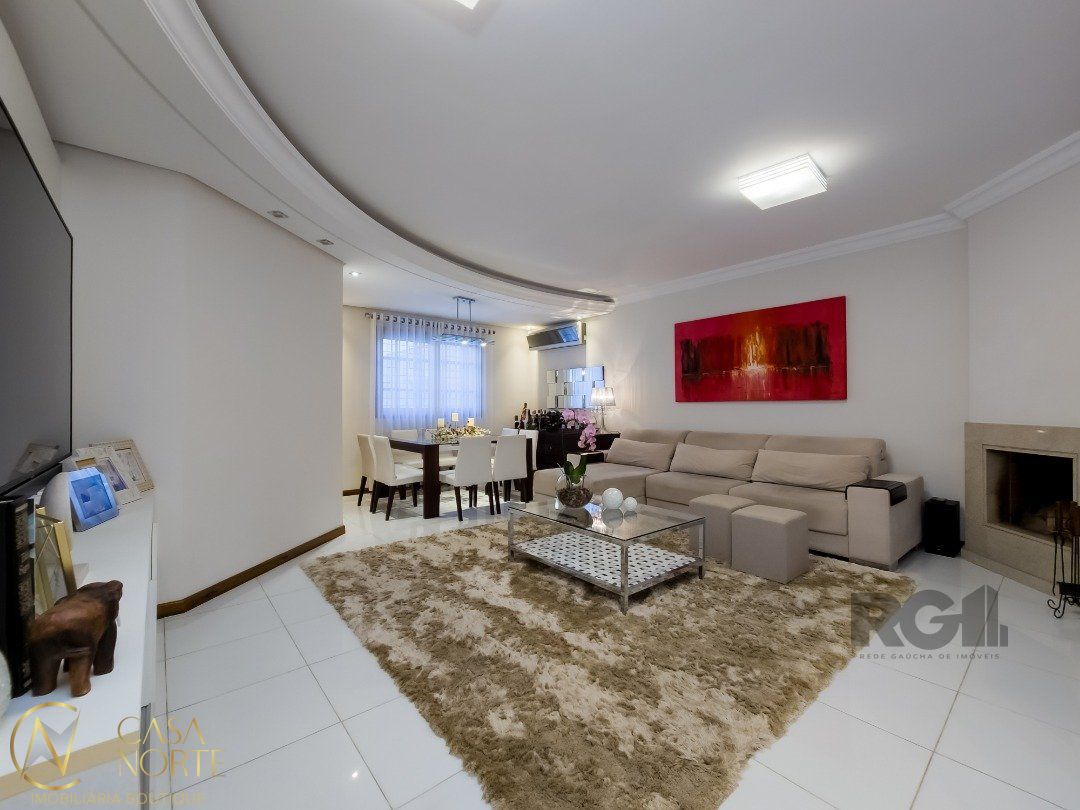 Casa de Condomínio à venda com 3 quartos, 243m², 1 suíte, 2 vagas, Avenida da Cavalhada no bairro Cavalhada em Porto Alegre