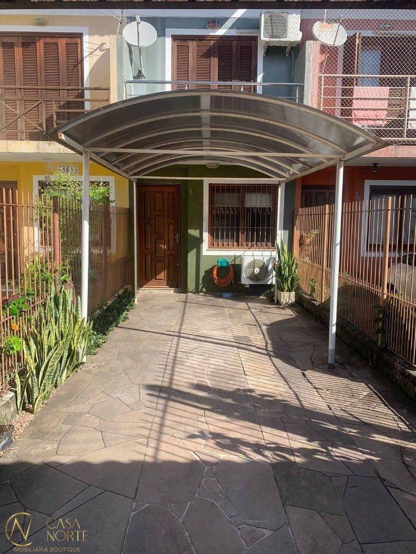 Casa à venda com 3 quartos, 77m², 2 vagas, Rua Izar Faria Correa Santanna no bairro Hípica em Porto Alegre