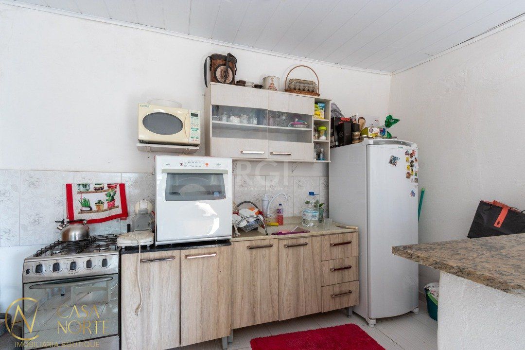 Casa à venda com 6 quartos, 240m², 3 suítes, 2 vagas, Avenida Ester no bairro Glória em Porto Alegre