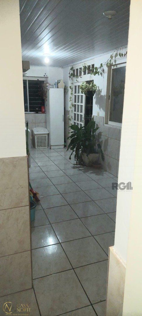 Casa à venda com 4 quartos, 385m², 3 suítes, 2 vagas, Estrada do Rincao no bairro Belém Velho em Porto Alegre