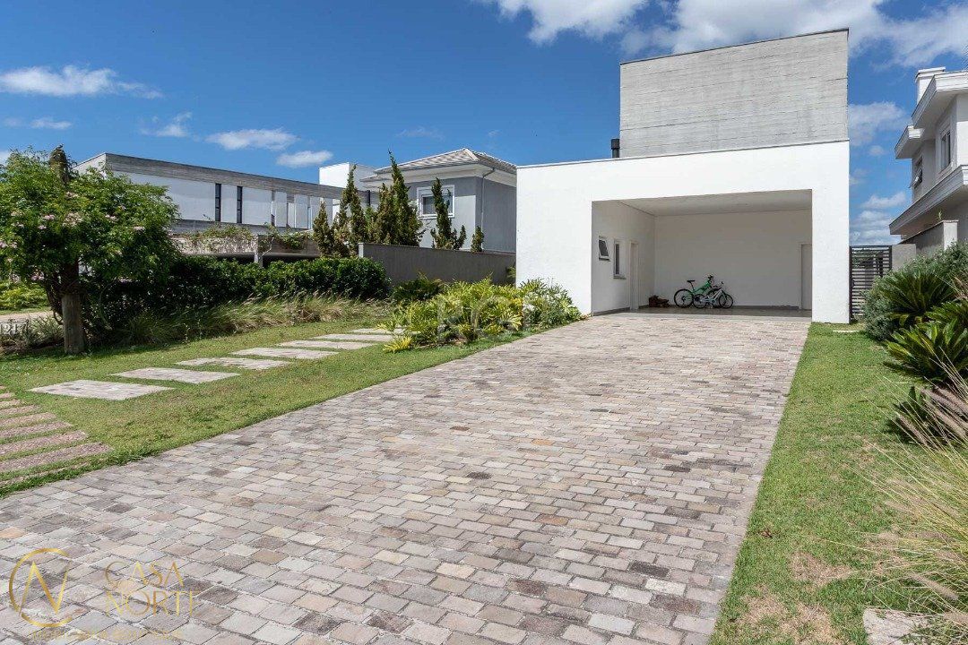 Casa de Condomínio à venda com 4 quartos, 403m², 4 suítes, 4 vagas, Avenida Juca Batista no bairro Belém Novo em Porto Alegre