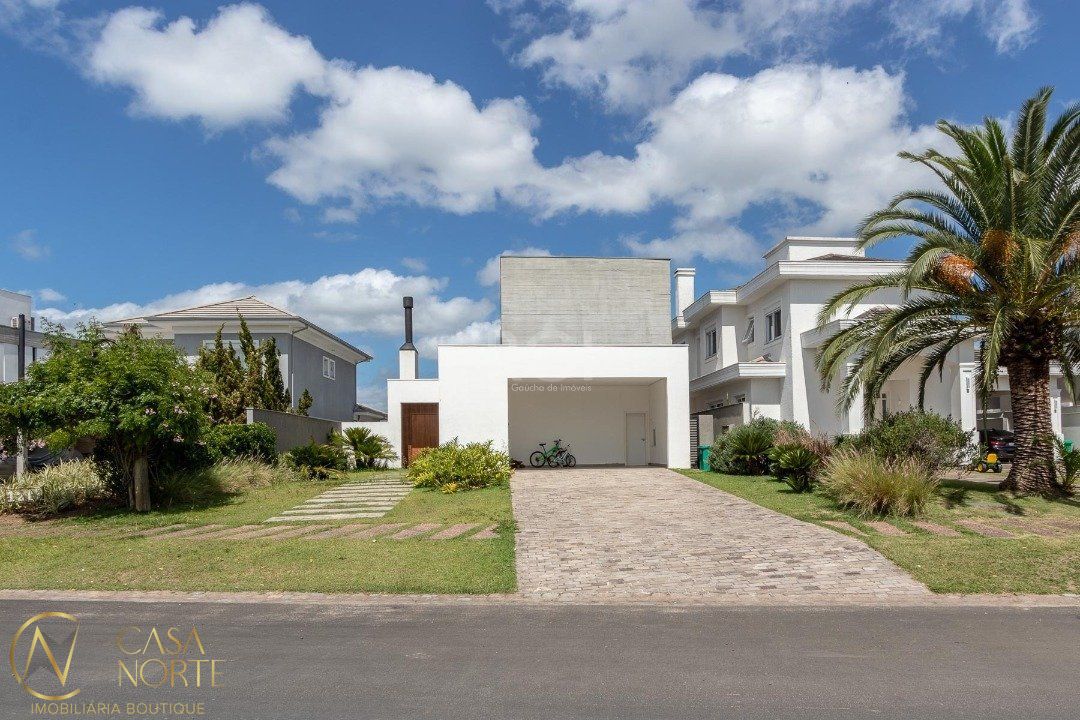 Casa de Condomínio à venda com 4 quartos, 403m², 4 suítes, 4 vagas, Avenida Juca Batista no bairro Belém Novo em Porto Alegre
