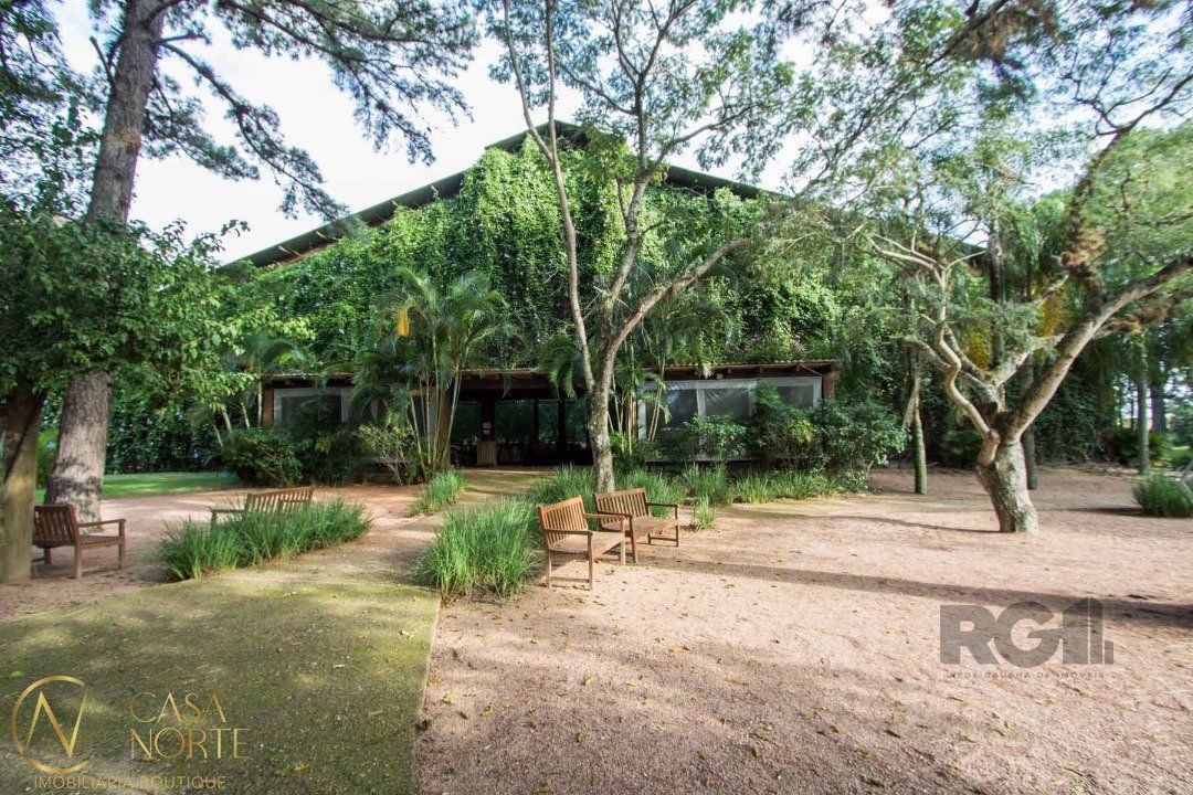 Casa de Condomínio à venda com 3 quartos, 318m², 3 suítes, 4 vagas, Avenida Juca Batista no bairro Belém Novo em Porto Alegre
