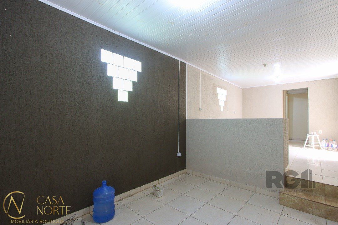 Casa à venda com 2 quartos, 109m², 1 vaga, Rua General Rondon no bairro Tristeza em Porto Alegre