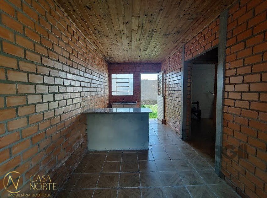 Casa à venda com 2 quartos, 40m², 1 vaga, Rua Tenente Isolino Segobia no bairro Vila Nova em Porto Alegre