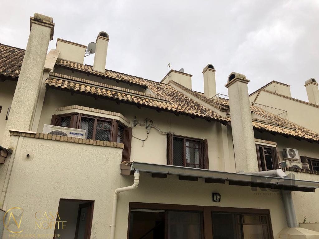 Casa de Condomínio à venda com 4 quartos, 240m², 1 suíte, 2 vagas, Rua Manajo no bairro Vila Assunção em Porto Alegre