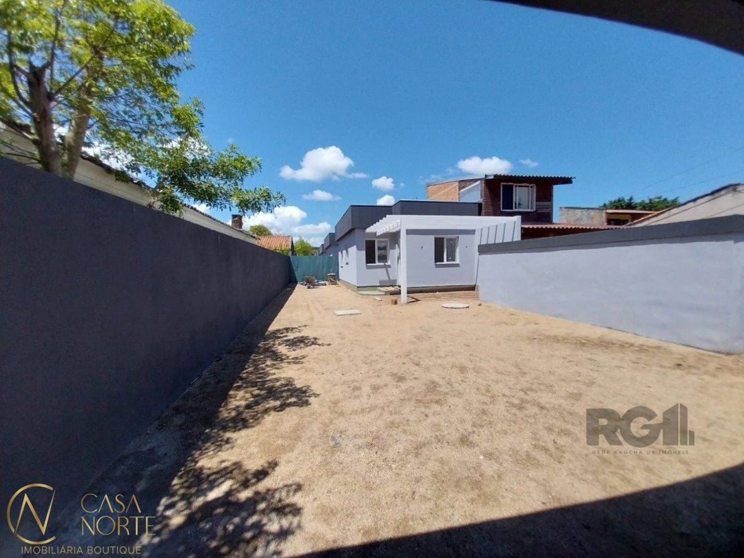 Casa à venda com 2 quartos, 91m², 1 vaga, Rua Jorge Mello Guimarães no bairro Belém Novo em Porto Alegre
