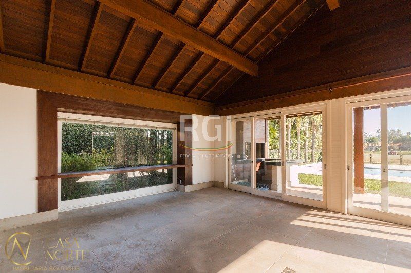 Casa de Condomínio à venda com 4 quartos, 322m², 4 suítes, 2 vagas, Avenida Juca Batista no bairro Chapéu do Sol em Porto Alegre