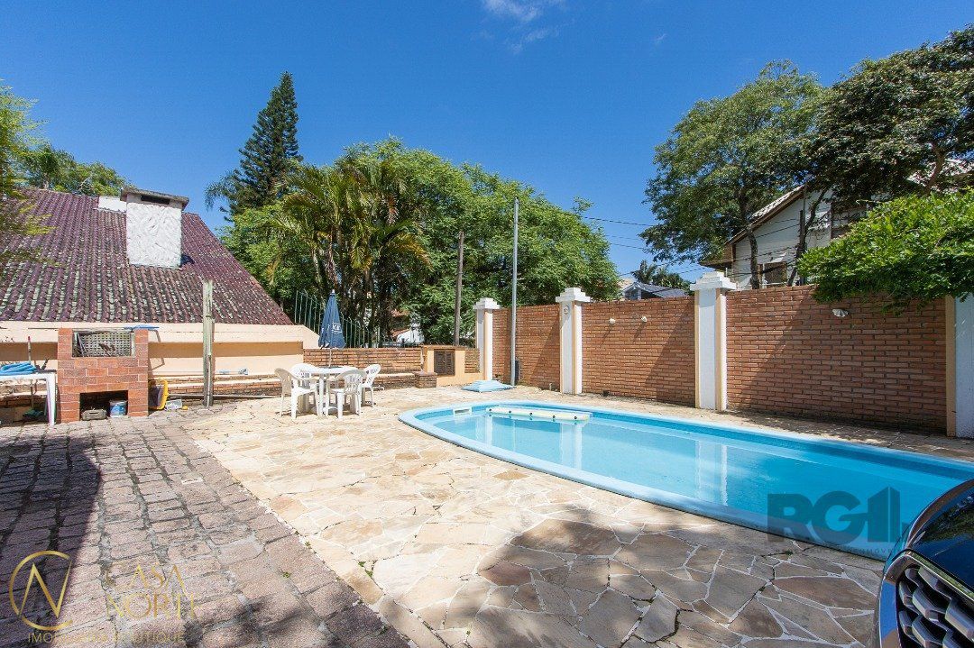 Casa à venda com 4 quartos, 580m², 3 suítes, 5 vagas, Rua João Mendes Ouriques no bairro Jardim Isabel em Porto Alegre