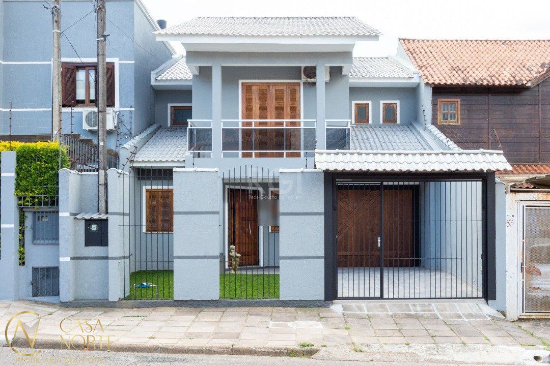 Casa à venda com 3 quartos, 247m², 1 suíte, 4 vagas, Rua Giobatta Giuseppe Petracco no bairro Vila Nova em Porto Alegre