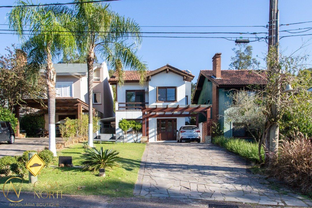 Casa de Condomínio à venda com 4 quartos, 226m², 2 suítes, 4 vagas, Avenida Juca Batista no bairro Belém Novo em Porto Alegre