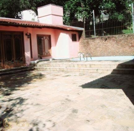 Casa à venda com 5 quartos, 320m², 1 suíte, 3 vagas, Rua Alcebiades Antônio dos Santos no bairro Nonoai em Porto Alegre