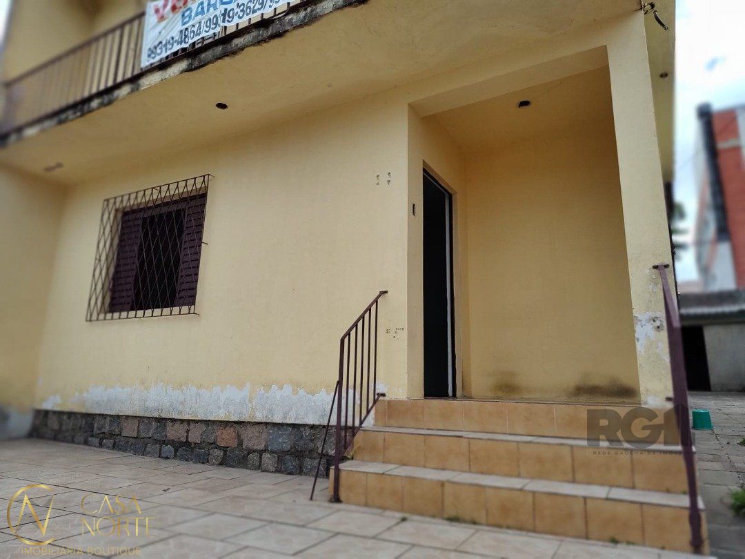 Casa à venda com 4 quartos, 247m², 4 vagas, Rua Joaquim Norberto no bairro Partenon em Porto Alegre