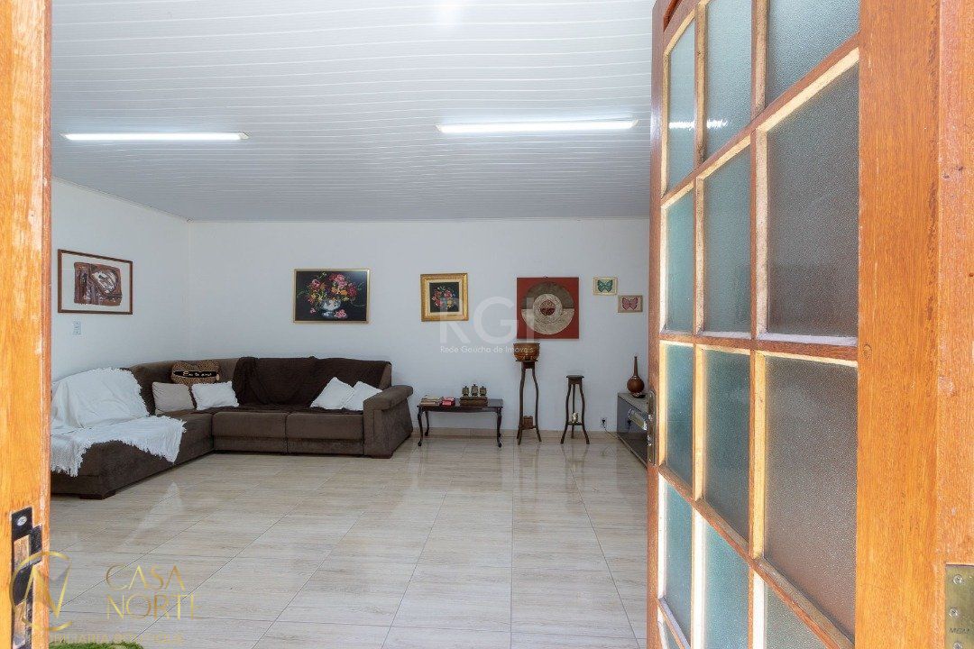 Casa à venda com 4 quartos, 370m², 1 suíte, 6 vagas, Estrada Afonso Lourenco Mariante no bairro Lomba do Pinheiro em Porto Alegre
