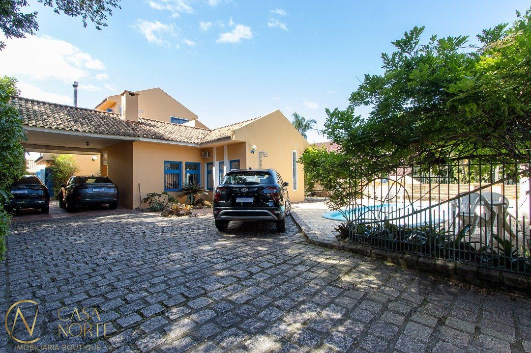 Casa à venda com 4 quartos, 580m², 3 suítes, 5 vagas, Rua João Mendes Ouriques no bairro Jardim Isabel em Porto Alegre