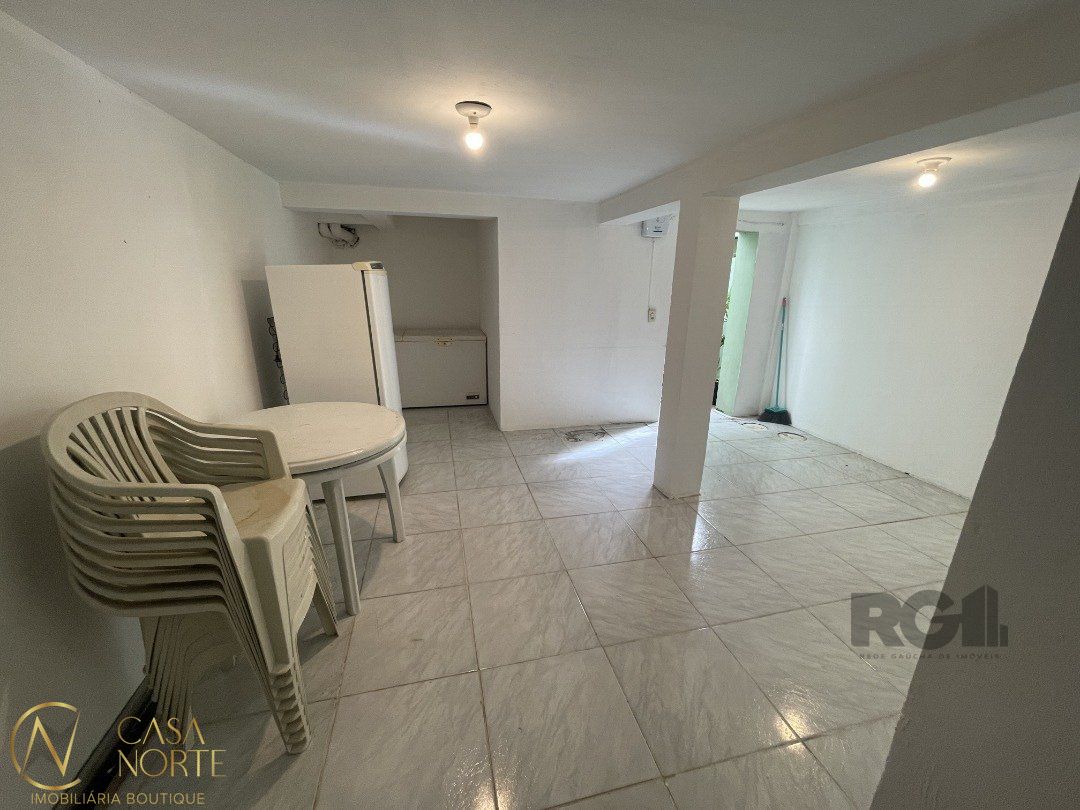 Casa de Condomínio à venda com 3 quartos, 216m², 1 suíte, 3 vagas, Rua Liberal no bairro Tristeza em Porto Alegre
