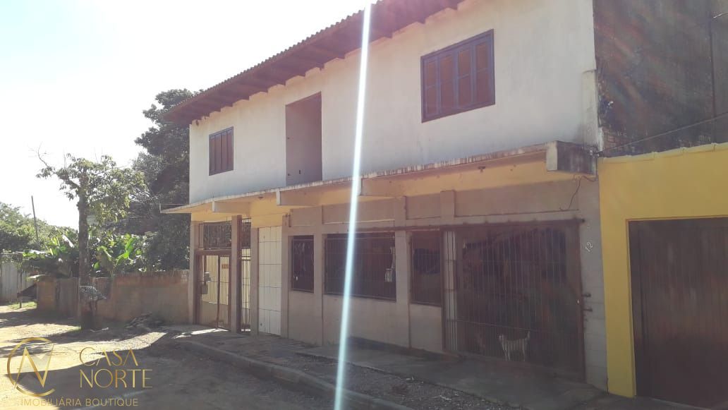 Casa à venda com 3 quartos, 480m², 4 vagas, Rua Sinodo no bairro Camaquã em Porto Alegre
