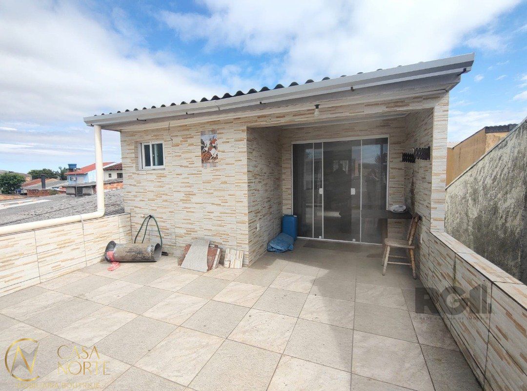 Casa à venda com 3 quartos, 195m², 1 suíte, 1 vaga, Rua Germano Bonow Filho no bairro Hípica em Porto Alegre