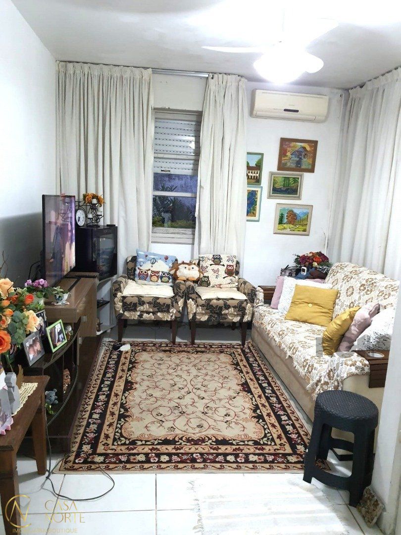 Casa à venda com 3 quartos, 148m², 4 vagas, Rua Rubens Alcantara no bairro Santa Tereza em Porto Alegre