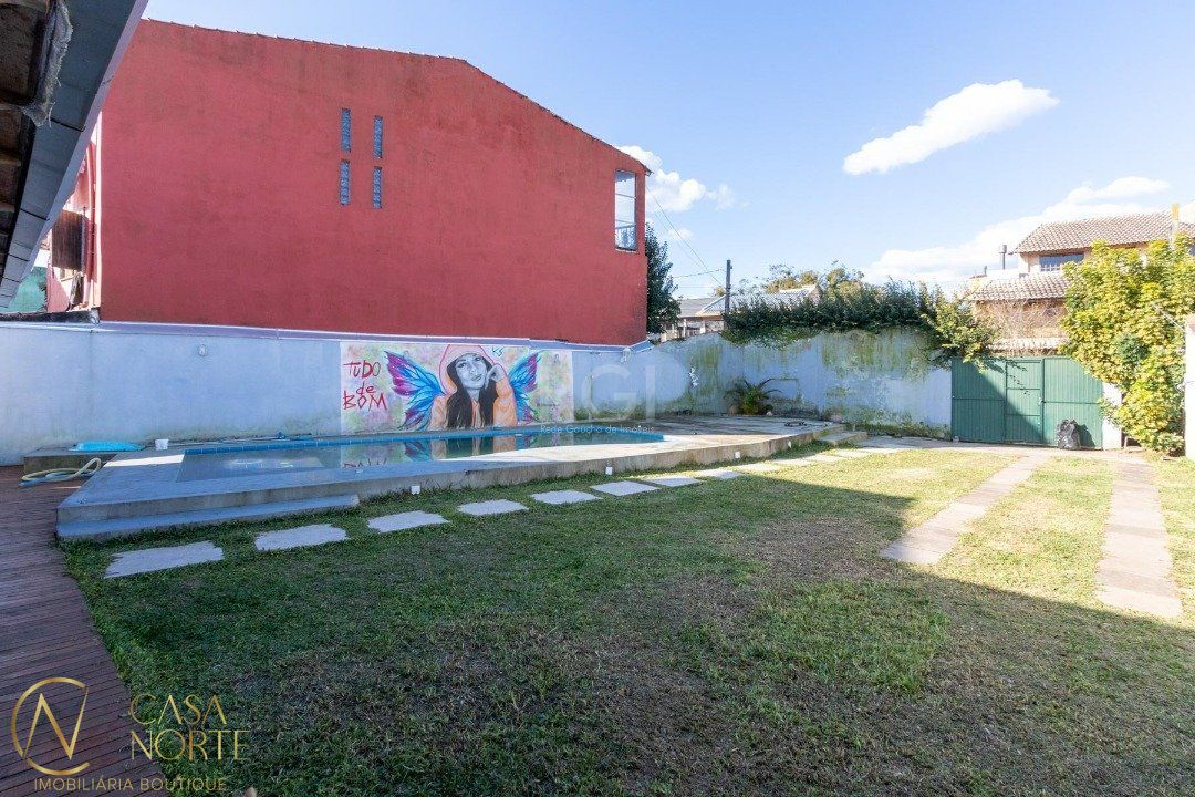 Casa à venda com 4 quartos, 120m², 1 suíte, 3 vagas, Rua Doutora Noemi Valle Rocha no bairro Serraria em Porto Alegre