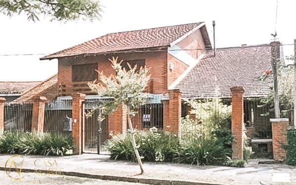 Casa à venda com 4 quartos, 404m², 1 suíte, 7 vagas, Rua Guaiana no bairro Vila Assunção em Porto Alegre