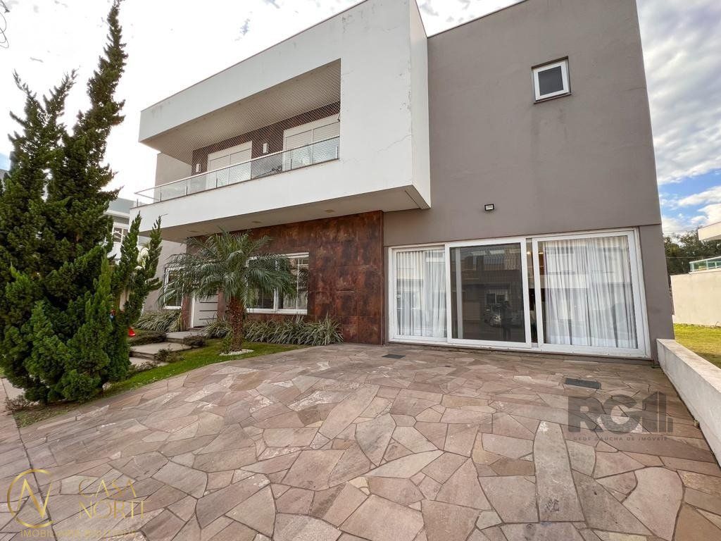 Casa de Condomínio à venda com 3 quartos, 219m², 3 suítes, 2 vagas, Rua Eroni Soares Machado no bairro Hípica em Porto Alegre
