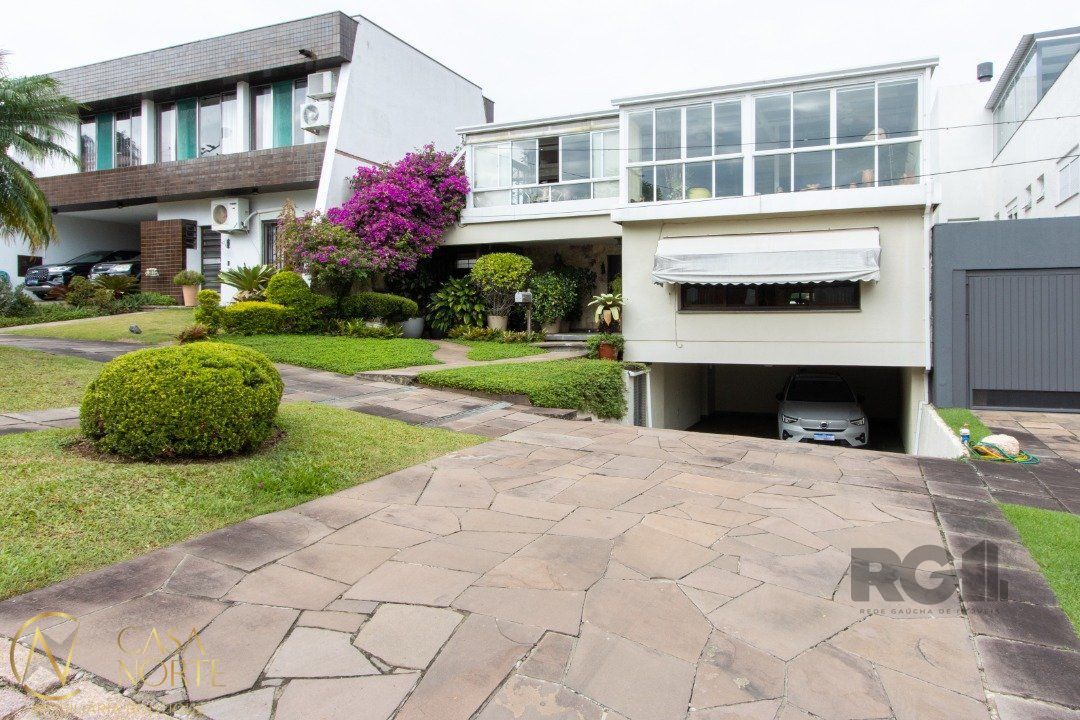 Casa de Condomínio à venda com 2 quartos, 285m², 1 suíte, 4 vagas, Rua Sinke no bairro Santa Tereza em Porto Alegre
