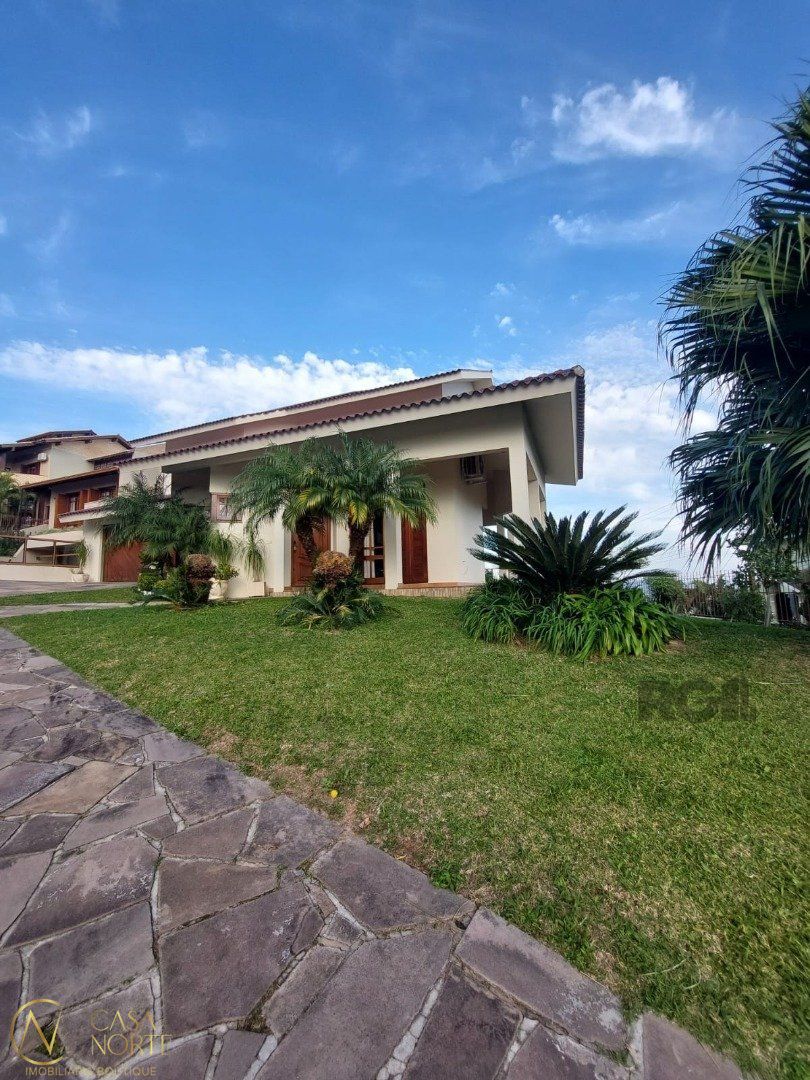 Casa de Condomínio à venda com 3 quartos, 451m², 1 suíte, 2 vagas, Rua Alcebiades Antônio dos Santos no bairro Nonoai em Porto Alegre