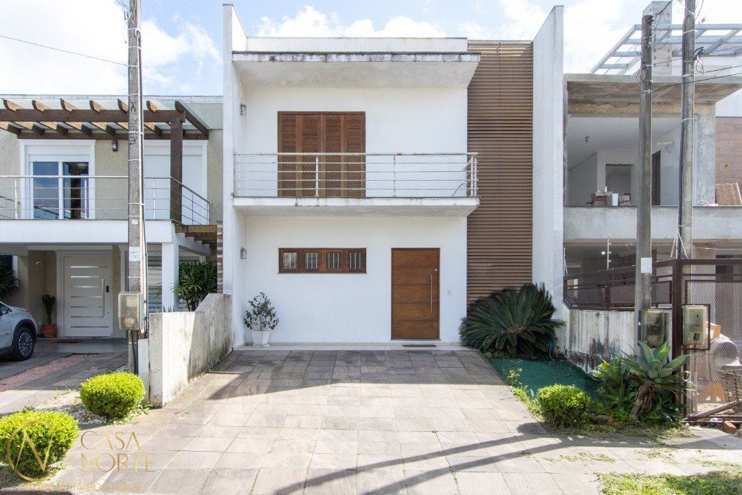 Casa à venda com 3 quartos, 161m², 1 suíte, 2 vagas, Rua Wilson Conceição Bona no bairro Hípica em Porto Alegre