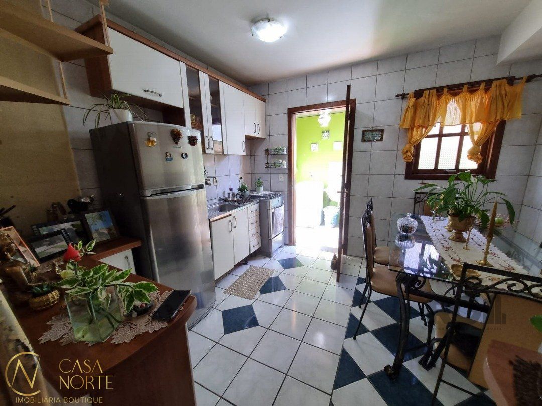 Casa de Condomínio à venda com 3 quartos, 108m², 1 vaga, Rua Silvio Silveira Soares no bairro Camaquã em Porto Alegre