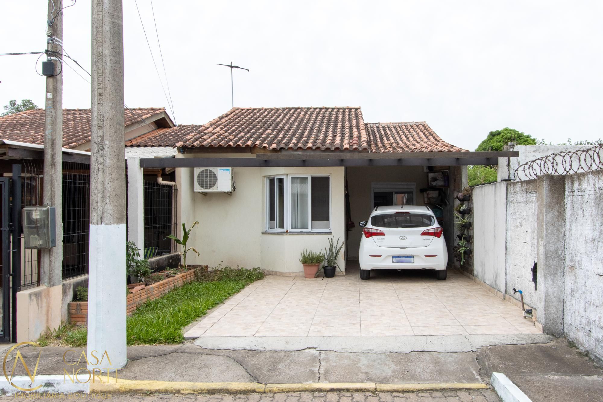 Casa de Condomínio à venda com 2 quartos, 109m², 1 vaga, Rua Capitão Pedroso no bairro Restinga em Porto Alegre