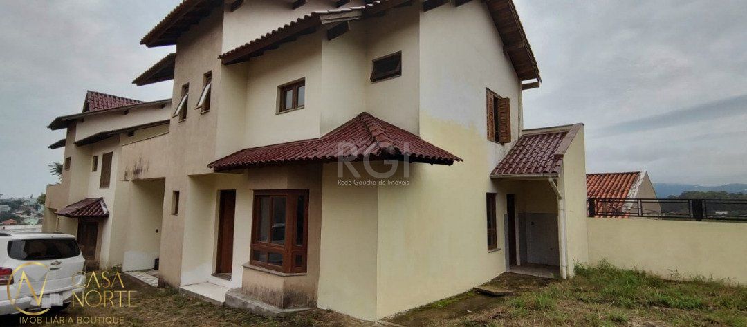 Casa de Condomínio à venda com 3 quartos, 158m², 1 suíte, 2 vagas, Rua Liberal no bairro Tristeza em Porto Alegre